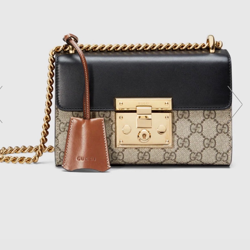 Beautiful authentic, black&brown leather, some minor scratches on gold hardware